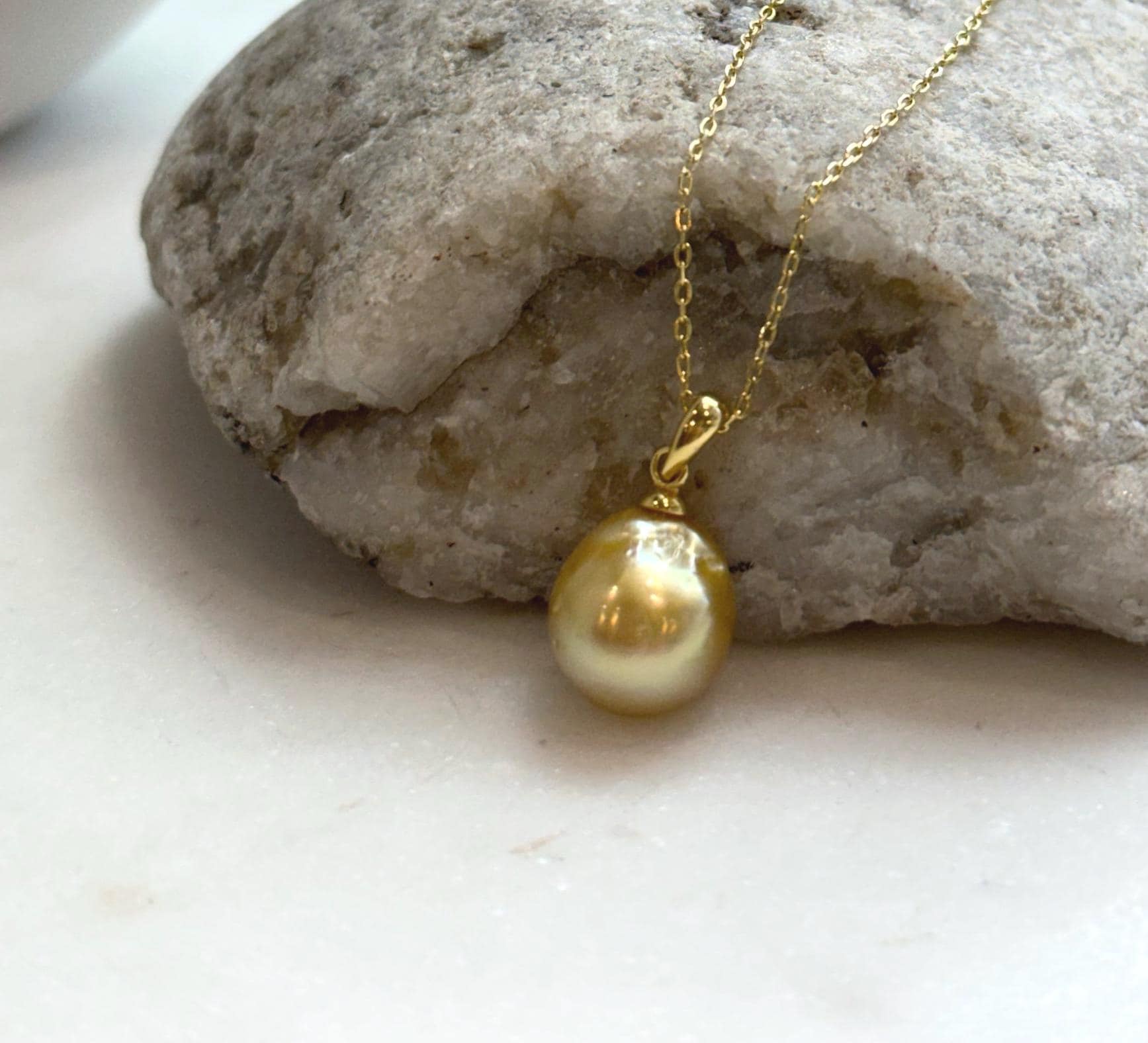 Elly’s 10.8mm South Sea deep tea Gold ocean Pearl pendant: Extreme luster mirrored, 1.9cm high, S925 silver w/ gold plated pendant.
