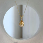 Elly’s 10mm South Sea deep Gold iridescent ocean Pearl pendant: Extreme luster mirrored, 2.2cm high, S925 silver w/ gold plated pendant.