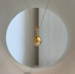 Elly’s 10mm South Sea deep Gold iridescent ocean Pearl pendant: Extreme luster mirrored, 2.2cm high, S925 silver w/ gold plated pendant.