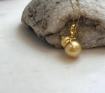 Elly’s 12.5mm South Sea deep Gold ocean Pearl pendant: Extreme luster mirrored, 2.5cm high, S925 silver w/ gold plated pendant.