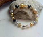 Elly’s Multicolor Ocean Pearls Bracelet: 18pcs South Sea Golden White Tahitian Akoya Pearls, Extreme luster, 7.2-10.4mm, 7.7” knotted