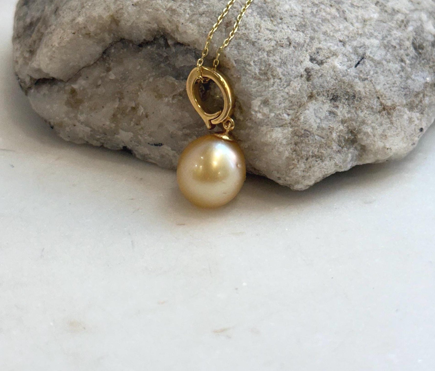 Elly’s 11.9mm South Sea deep Gold ocean Pearl pendant: Extreme luster mirrored, 2.7cm high, S925 silver w/ gold plated pendant.