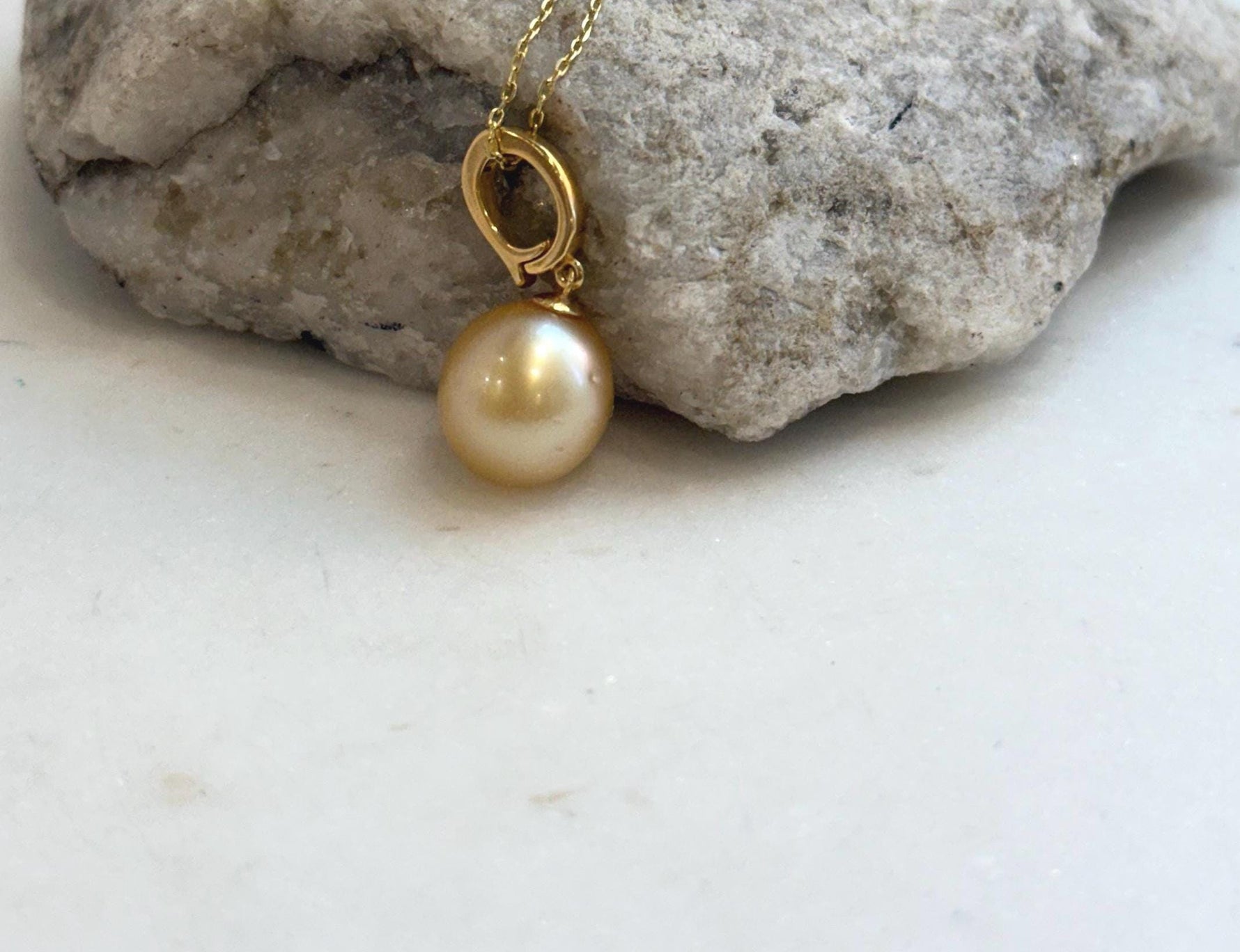 Elly’s 11.9mm South Sea deep Gold ocean Pearl pendant: Extreme luster mirrored, 2.7cm high, S925 silver w/ gold plated pendant.