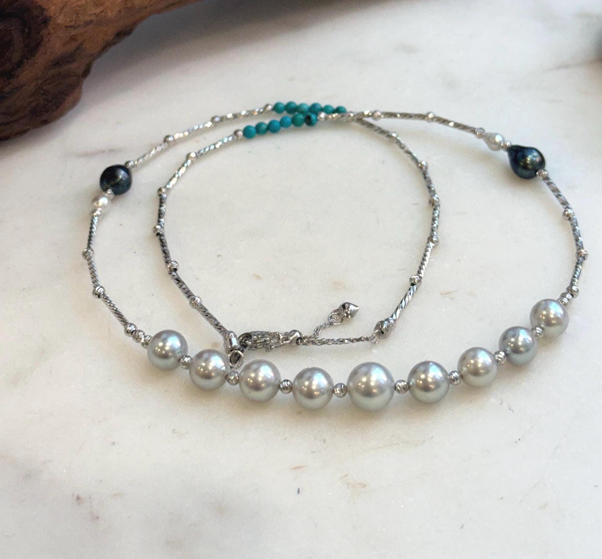 Elena Elly’s 9pcs 7.1-8.5mm Akoya ocean pearls Designed Necklace: Extreme luster mirrored, S925 silver necklace, to 21.3”.