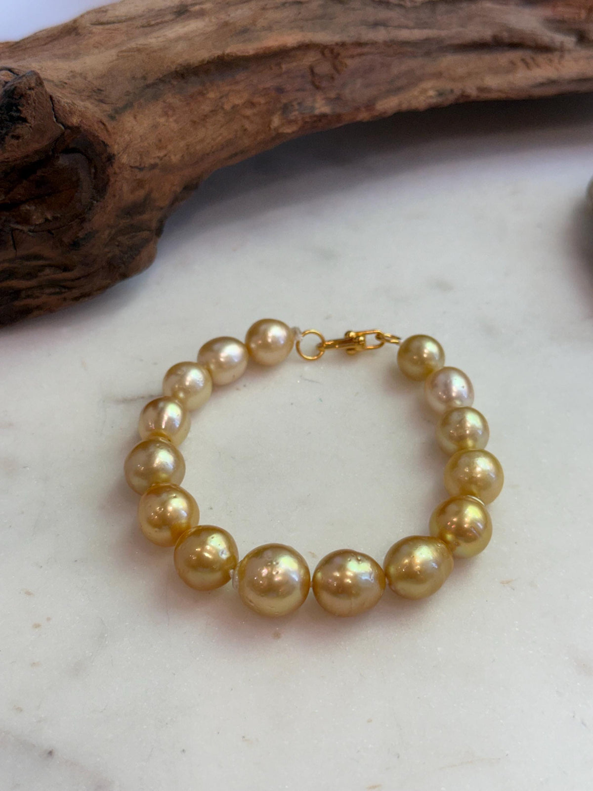 Elly’s 10.4-13.4mm 15pcs Genius South sea golden Ocean Pearls bracelet: Extreme luster, 8.5”, S925 silver bracelet.