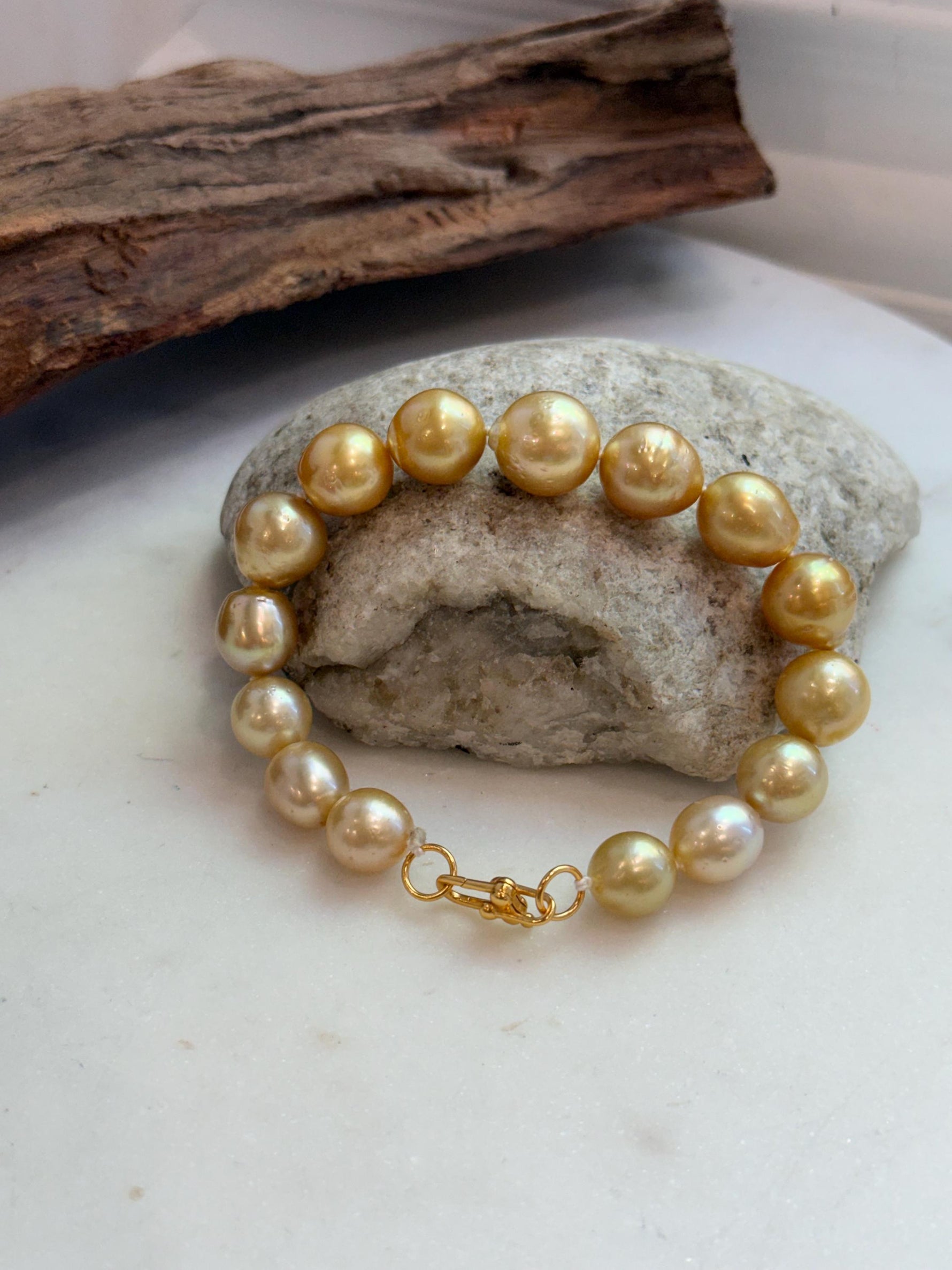Elly’s 10.4-13.4mm 15pcs Genius South sea golden Ocean Pearls bracelet: Extreme luster, 8.5”, S925 silver bracelet.