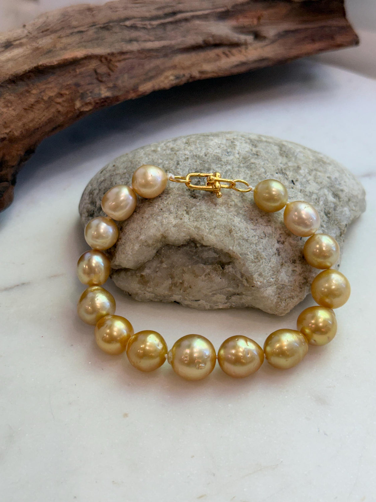Elly’s 10.4-13.4mm 15pcs Genius South sea golden Ocean Pearls bracelet: Extreme luster, 8.5”, S925 silver bracelet.