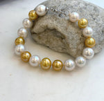 Elly’s 17pcs 10.2-11.5mm White golden Edison Pearls Bracelet: Extreme luster mirrored, 8.3” knotted, S925 silver Bracelet.