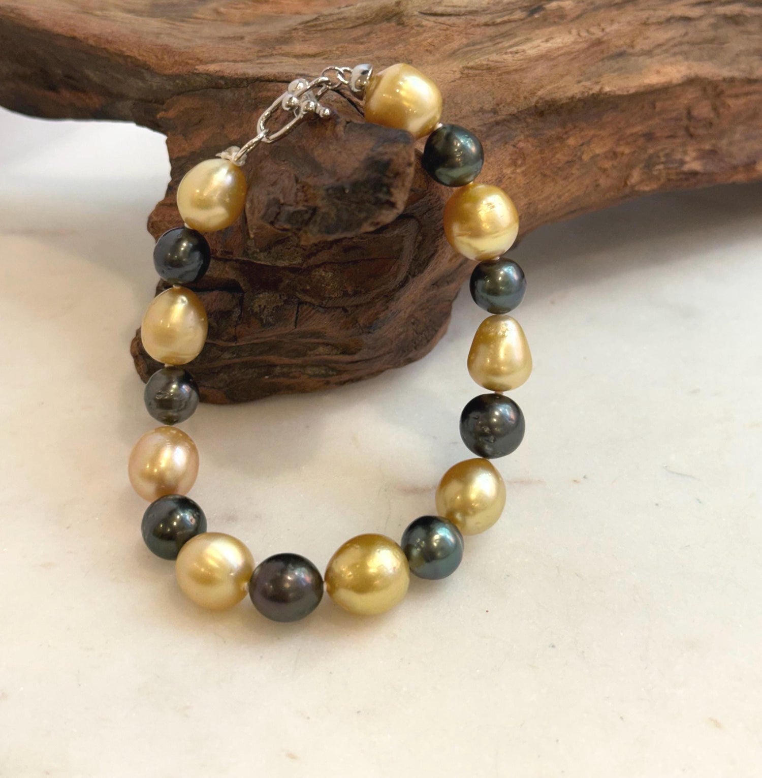 Elly’s 8.3-11mm 17pcs Genius South sea golden Tahitian Ocean Pearls bracelet: Extreme luster, 8.2”, S925 silver bracelet.