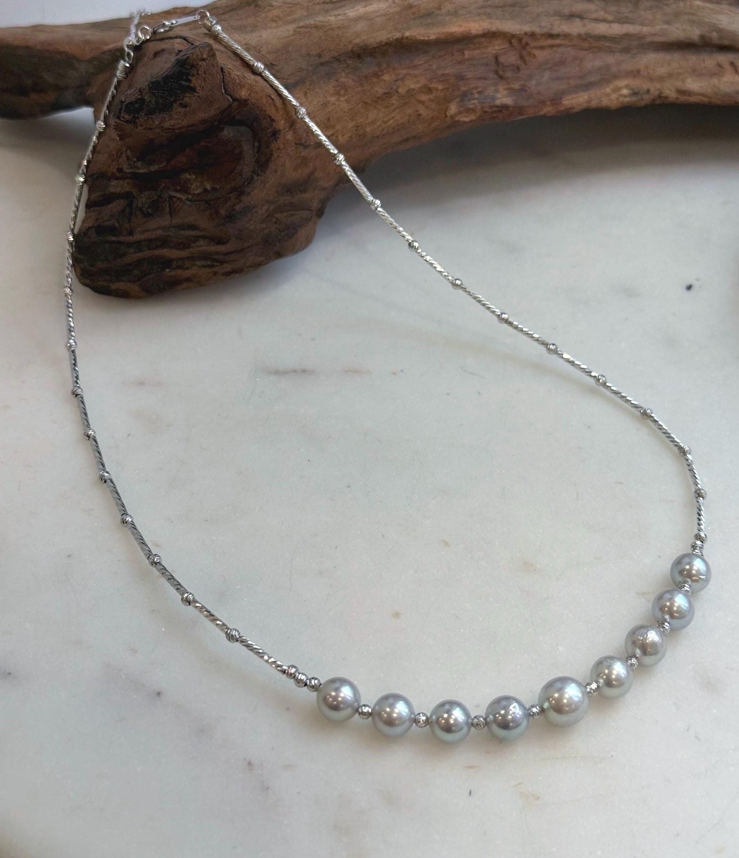 Elly’s 9pcs 7.2-8.1mm Akoya ocean pearls Designed Necklace: Extreme luster mirrored, S925 silver necklace, to 19.5”.