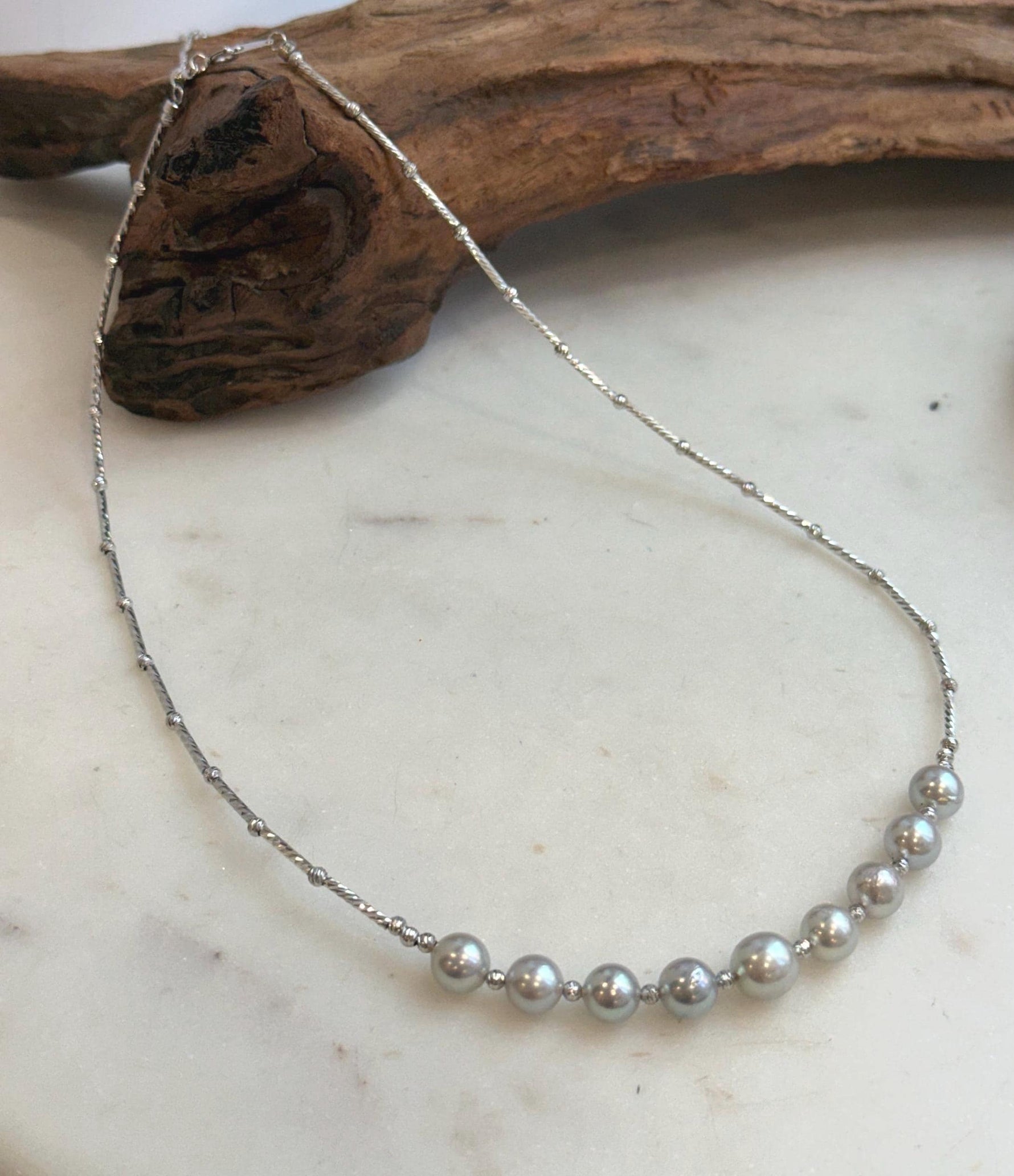 Elly’s 9pcs 7.2-8.1mm Akoya ocean pearls Designed Necklace: Extreme luster mirrored, S925 silver necklace, to 19.5”.