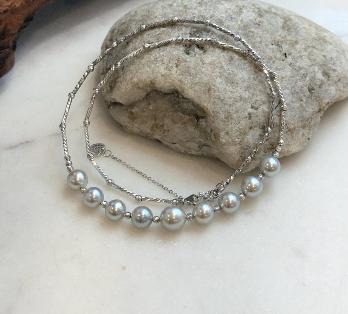 Elly’s 9pcs 7.2-8.1mm Akoya ocean pearls Designed Necklace: Extreme luster mirrored, S925 silver necklace, to 19.5”.