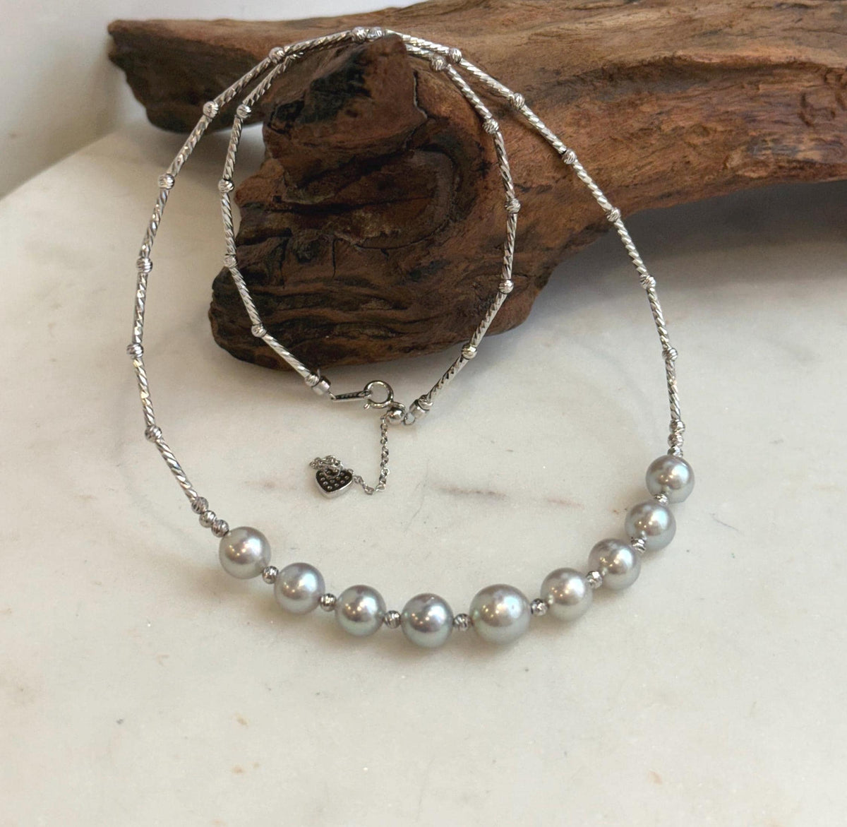 Elly’s 9pcs 7.2-8.1mm Akoya ocean pearls Designed Necklace: Extreme luster mirrored, S925 silver necklace, to 19.5”.