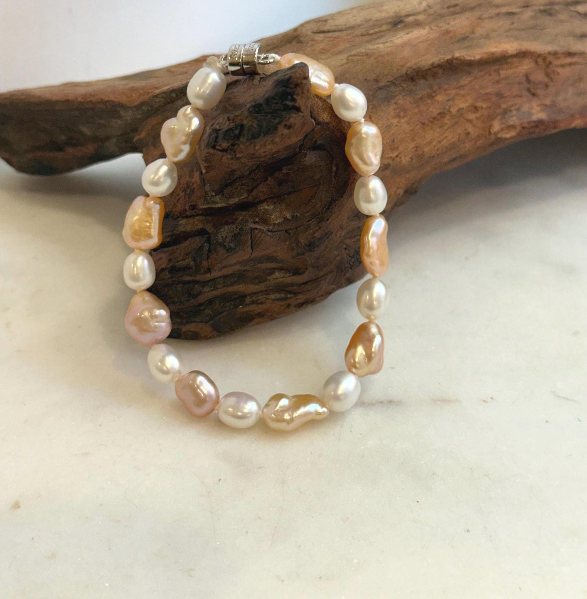Elly’s 6.6-8.5mm Freshwater Multicolored Pearls Bracelet: Extreme luster mirrored, 7.8”, S925 silver bracelet.