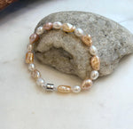 Elly’s 6.6-8.5mm Freshwater Multicolored Pearls Bracelet: Extreme luster mirrored, 7.8”, S925 silver bracelet.