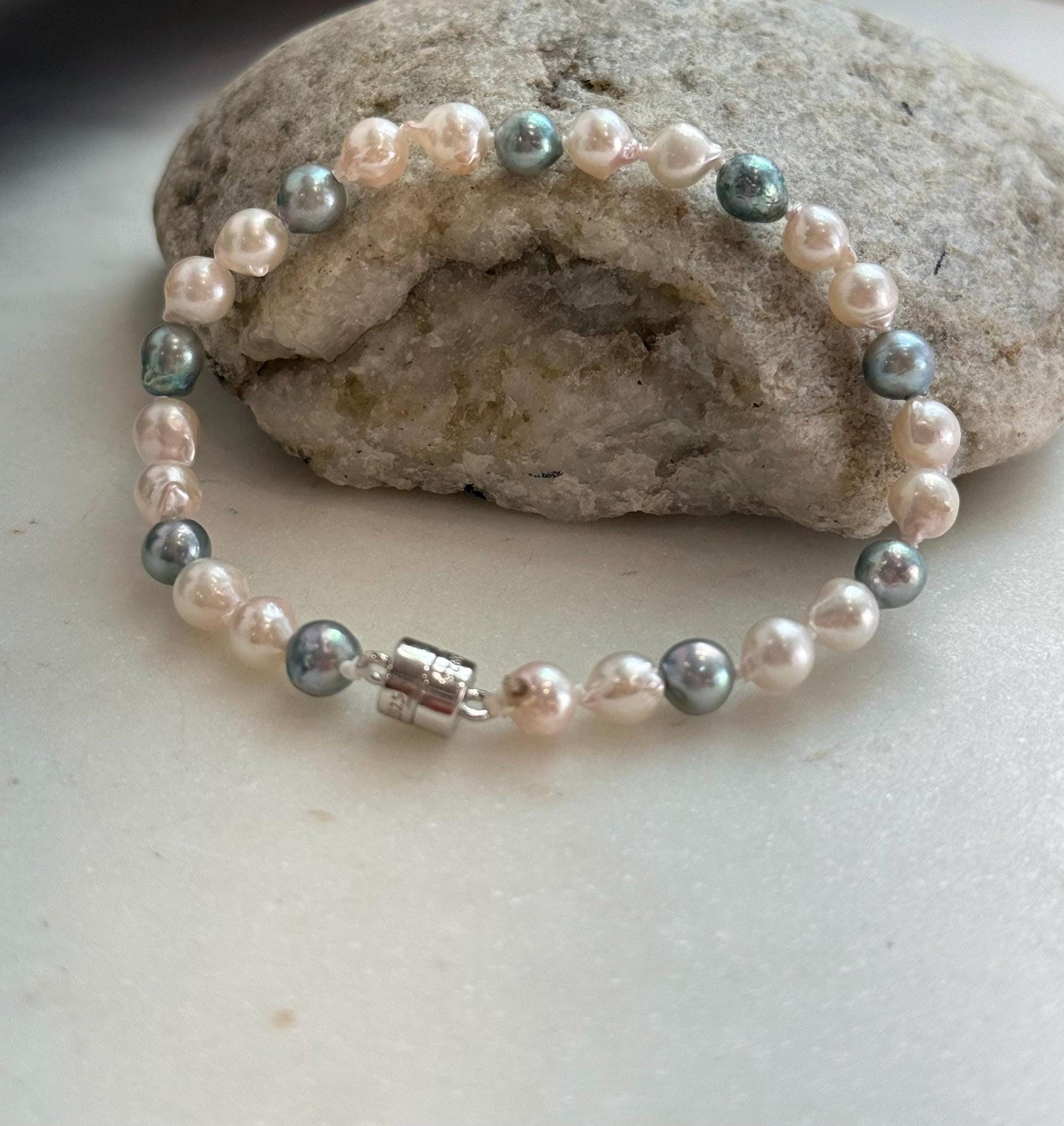 Elly’s 5.5-6mm Akoya Pink blue ocean pearls bracelet:Extreme luster mirrored, knotted, 7.4”, S925 silver bracelet.