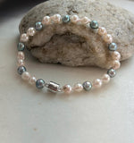 Elly’s 5.5-6mm Akoya Pink blue ocean pearls bracelet:Extreme luster mirrored, knotted, 7.4”, S925 silver bracelet.