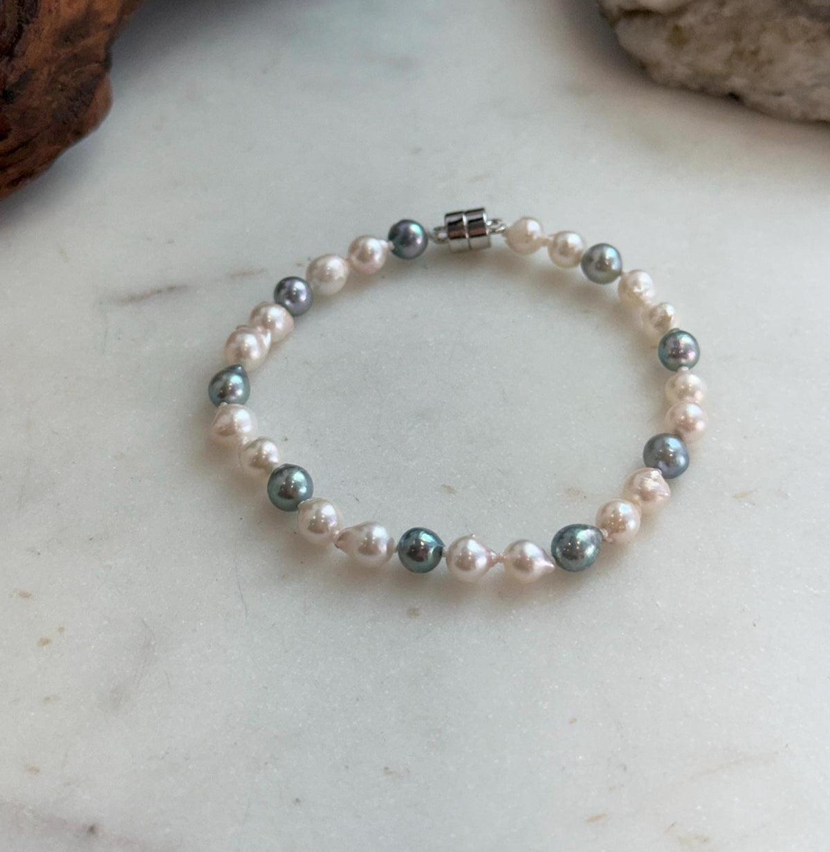 Elly’s 5.5-6mm Akoya Pink blue ocean pearls bracelet:Extreme luster mirrored, knotted, 7.4”, S925 silver bracelet.