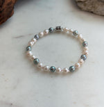 Elly’s 5.5-6mm Akoya Pink blue ocean pearls bracelet:Extreme luster mirrored, knotted, 7.4”, S925 silver bracelet.
