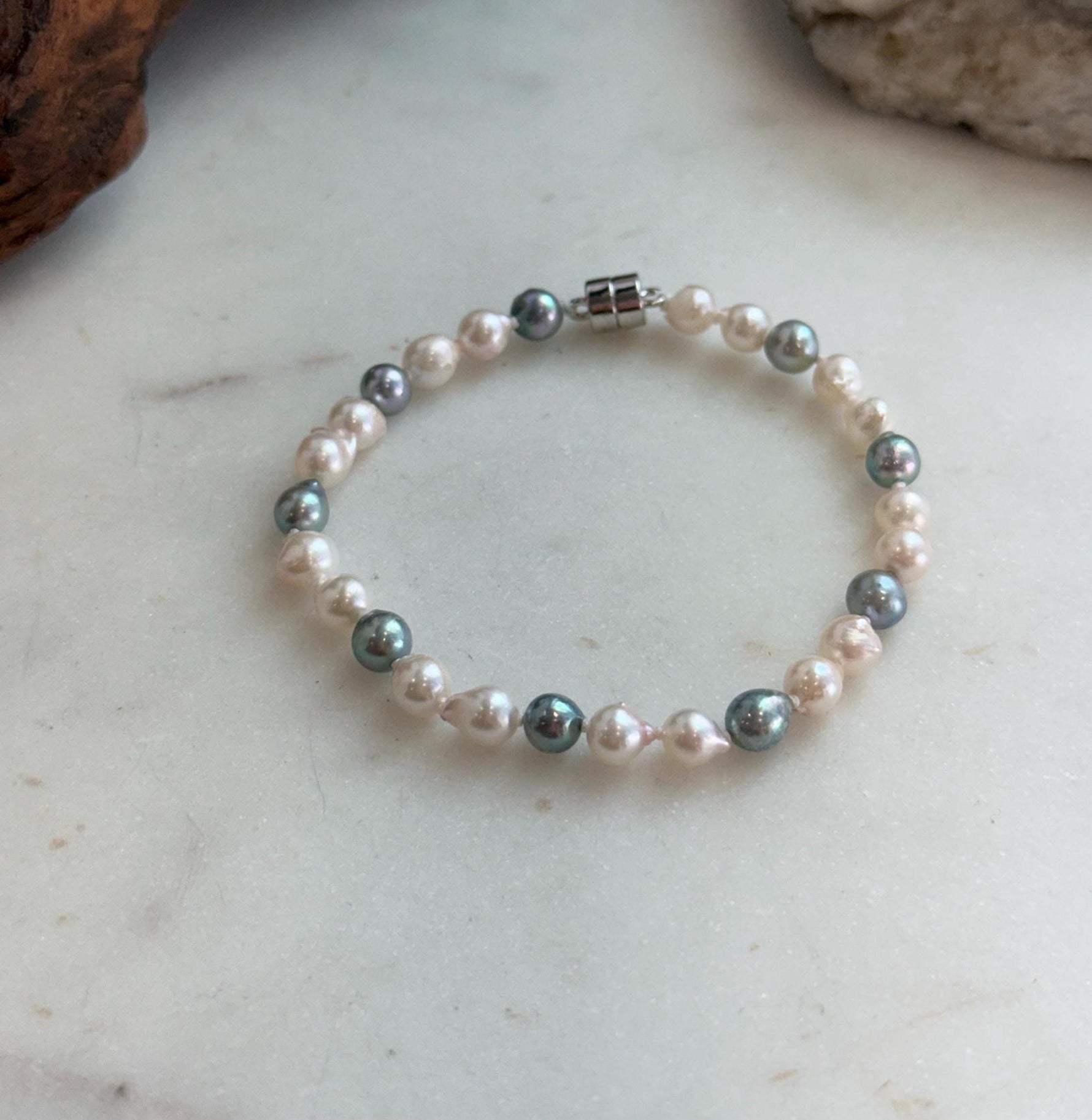 Elly’s 5.5-6mm Akoya Pink blue ocean pearls bracelet:Extreme luster mirrored, knotted, 7.4”, S925 silver bracelet.