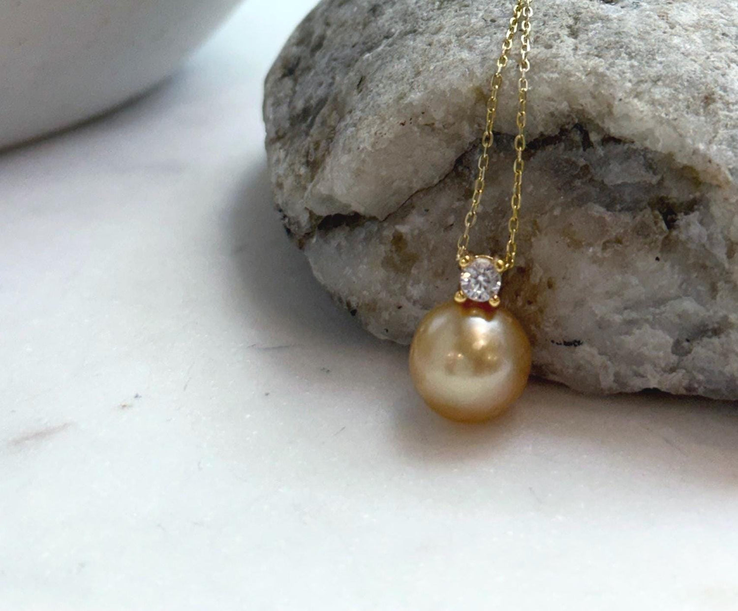 Elly’s 10.9mm South Sea deep Gold ocean Pearl pendant: Extreme luster mirrored, 1.5cm high, S925 silver w/ gold plated pendant.