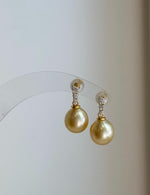 Elly’s 9.3mm South sea ultra golden ocean Pearls Earrings: Extreme luster mirrored, 1.8cm high, S925 silver earrings.