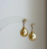 Elly’s 9.3mm South sea ultra golden ocean Pearls Earrings: Extreme luster mirrored, 1.8cm high, S925 silver earrings.