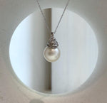 Elly’s 13.4mm South Sea White ocean Pearl pendant: Extreme luster mirrored, 2.4cm high, S925 silver w/ gold plated pendant.