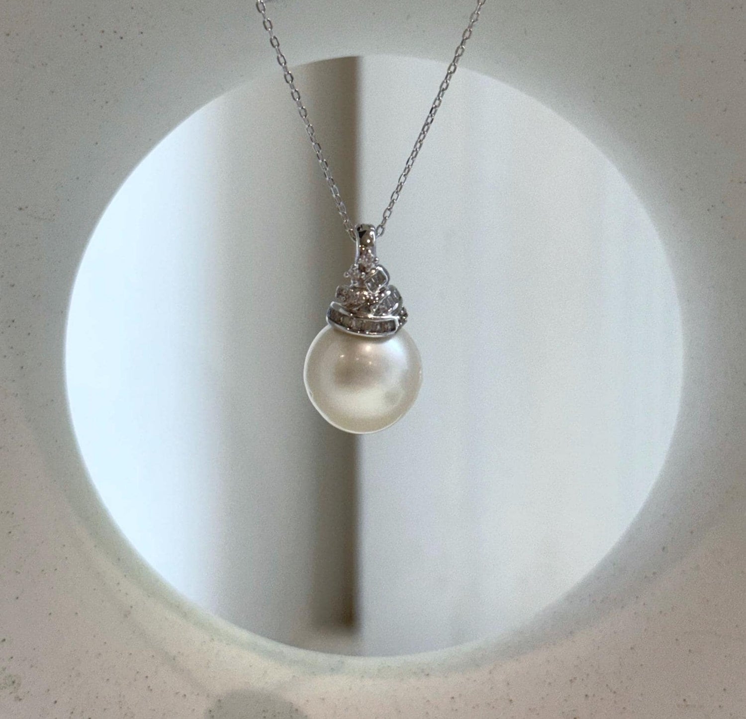 Elly’s 13.4mm South Sea White ocean Pearl pendant: Extreme luster mirrored, 2.4cm high, S925 silver w/ gold plated pendant.