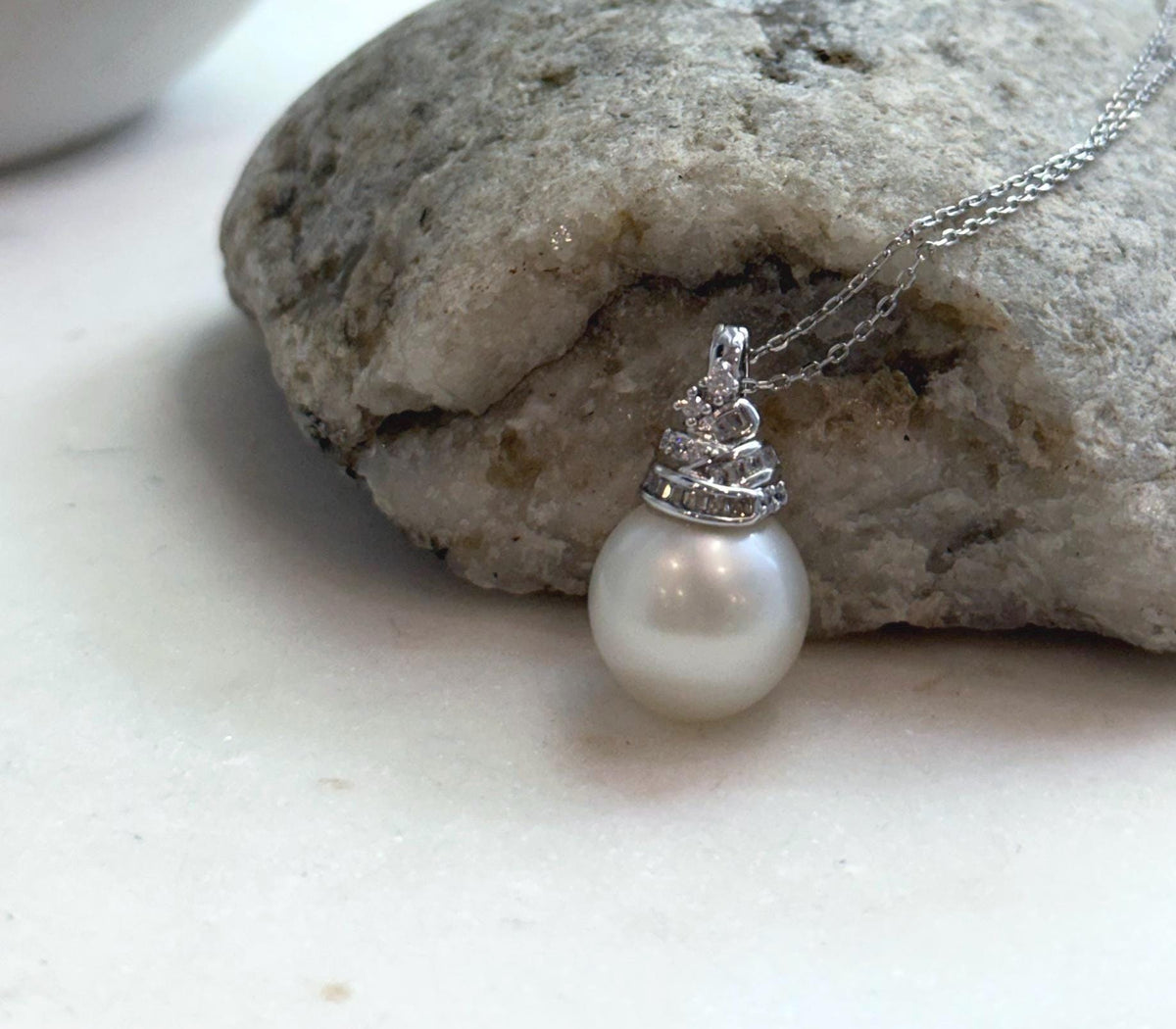 Elly’s 13.4mm South Sea White ocean Pearl pendant: Extreme luster mirrored, 2.4cm high, S925 silver w/ gold plated pendant.