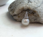 Elly’s 13.4mm South Sea White ocean Pearl pendant: Extreme luster mirrored, 2.4cm high, S925 silver w/ gold plated pendant.