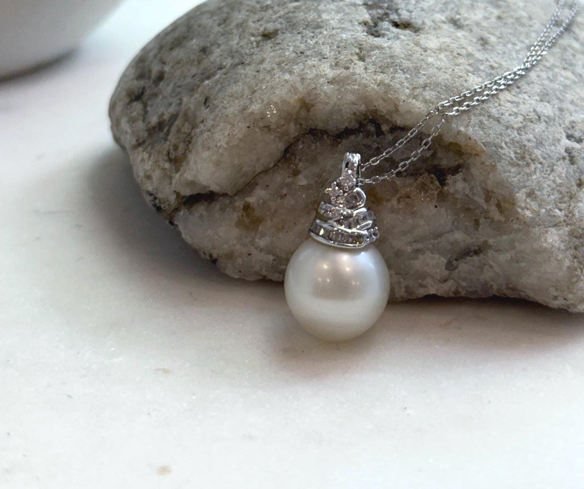 Elly’s 13.4mm South Sea White ocean Pearl pendant: Extreme luster mirrored, 2.4cm high, S925 silver w/ gold plated pendant.