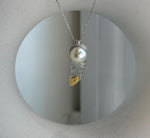 Elly’s 9.3mm Genius South sea ivory Ocean Pearl leather Pendant: Extreme luster mirrored, 1x3cm, S925 silver pendant.