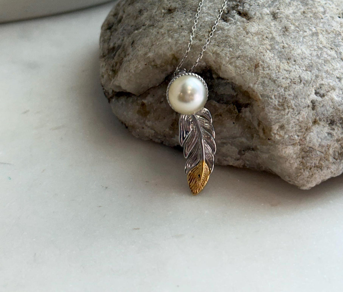 Elly’s 9.3mm Genius South sea ivory Ocean Pearl leather Pendant: Extreme luster mirrored, 1x3cm, S925 silver pendant.