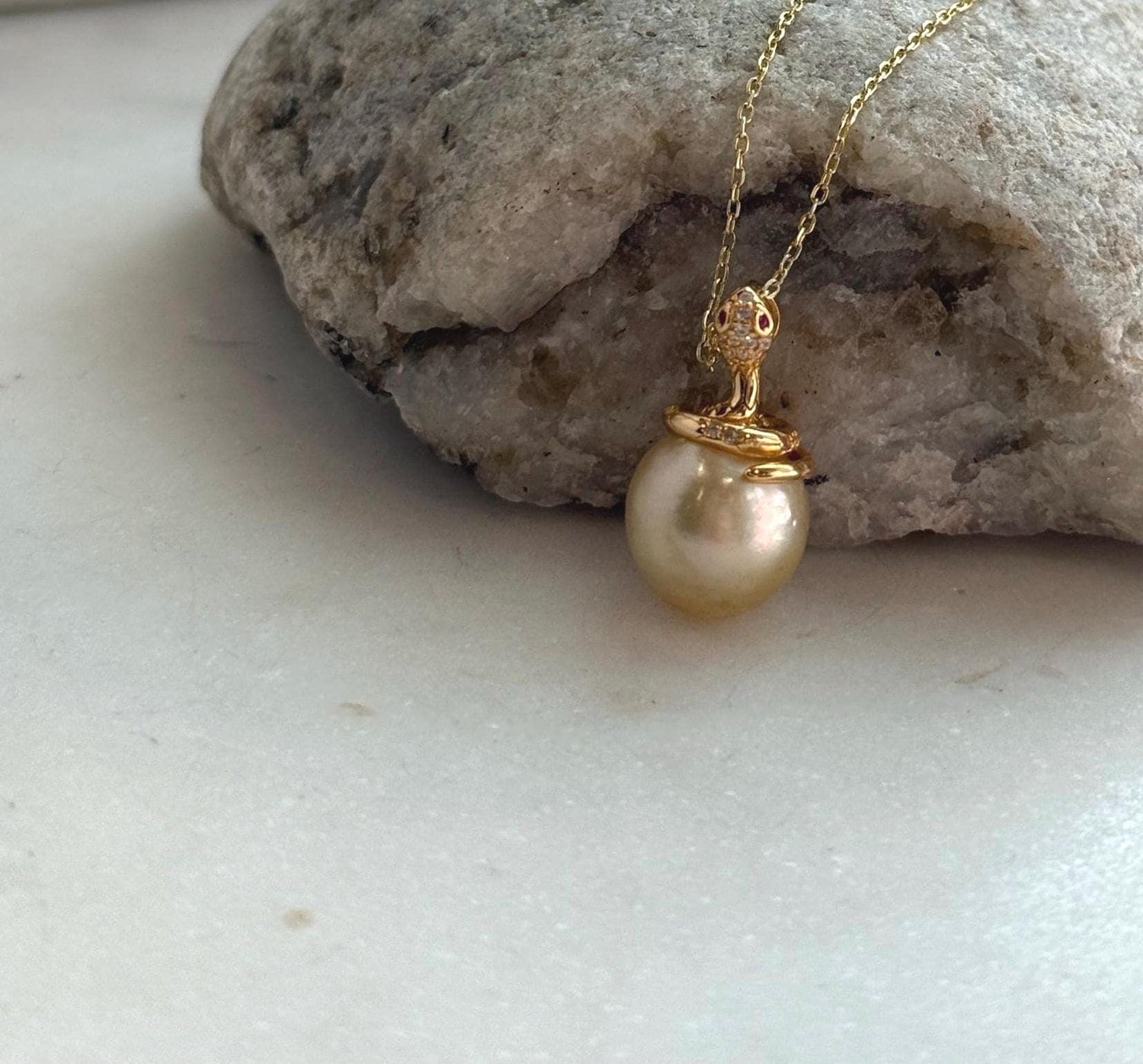 Elly’s 11.6mm South Sea Gold iridescent ocean Pearl Snake pendant: Extreme luster mirrored, 2.1cm high, S925 silver pendant.