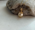 Elly’s 11.6mm South Sea Gold iridescent ocean Pearl Snake pendant: Extreme luster mirrored, 2.1cm high, S925 silver pendant.