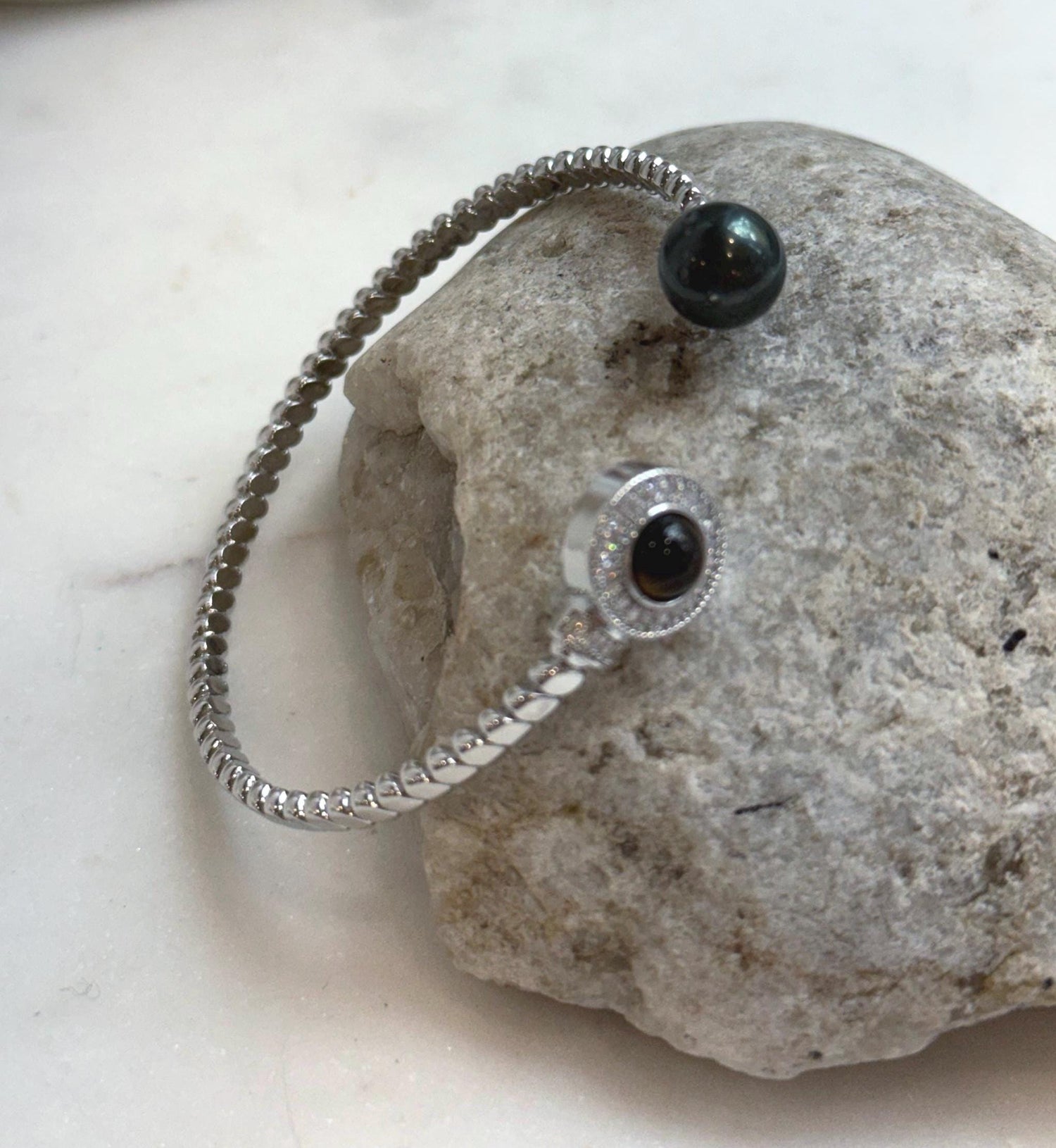 Elly’s Tahitian peacock hunter Ocean Pearl Bracelet: extreme luster mirrored, 9.6mm, adjustable bracelet.