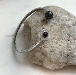 Elly’s Tahitian peacock hunter Ocean Pearl Bracelet: extreme luster mirrored, 9.6mm, adjustable bracelet.