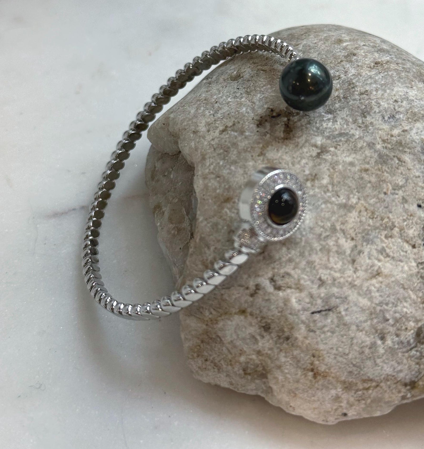 Elly’s Tahitian peacock hunter Ocean Pearl Bracelet: extreme luster mirrored, 9.6mm, adjustable bracelet.