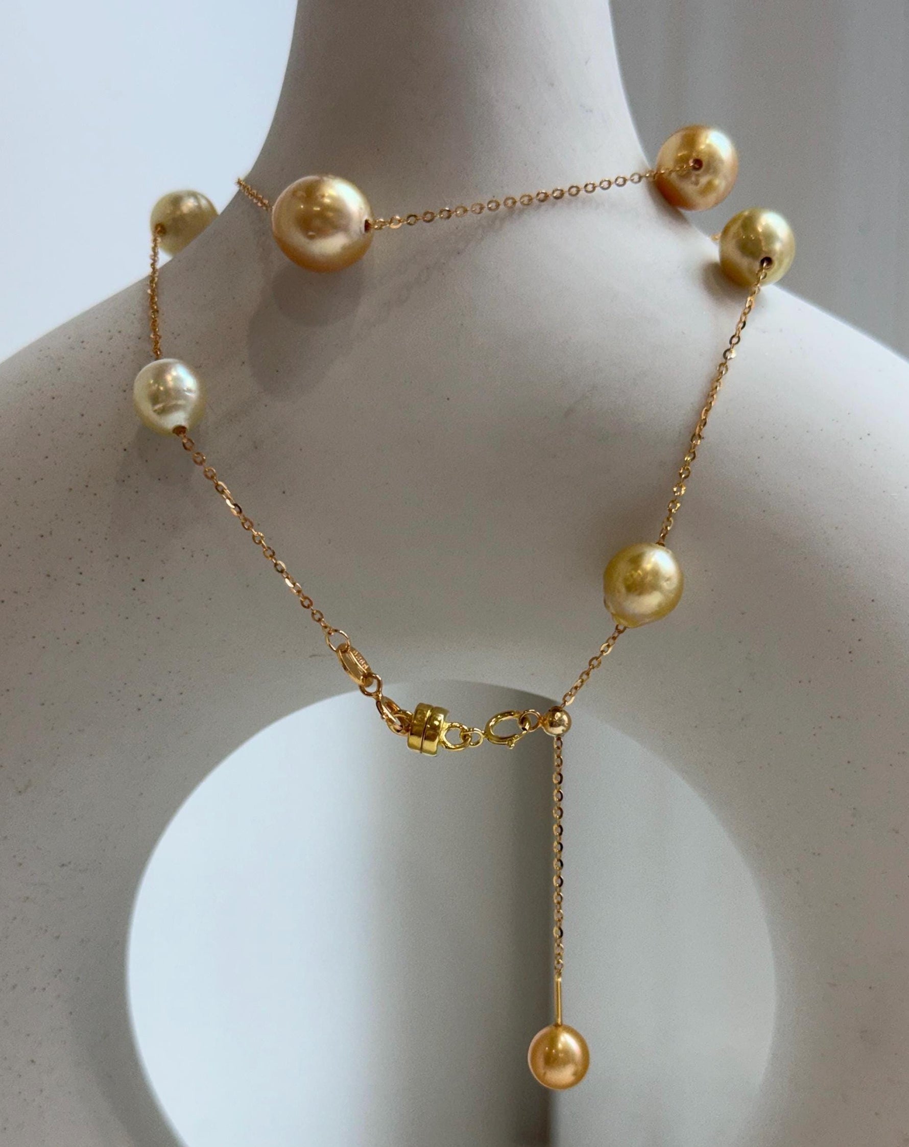 Elly’s 9pcs 8.2-10.1mm South sea golden ocean pearls Satellite Necklace: Extreme luster mirrored, S925 silver satellite necklace, to 17.7”.