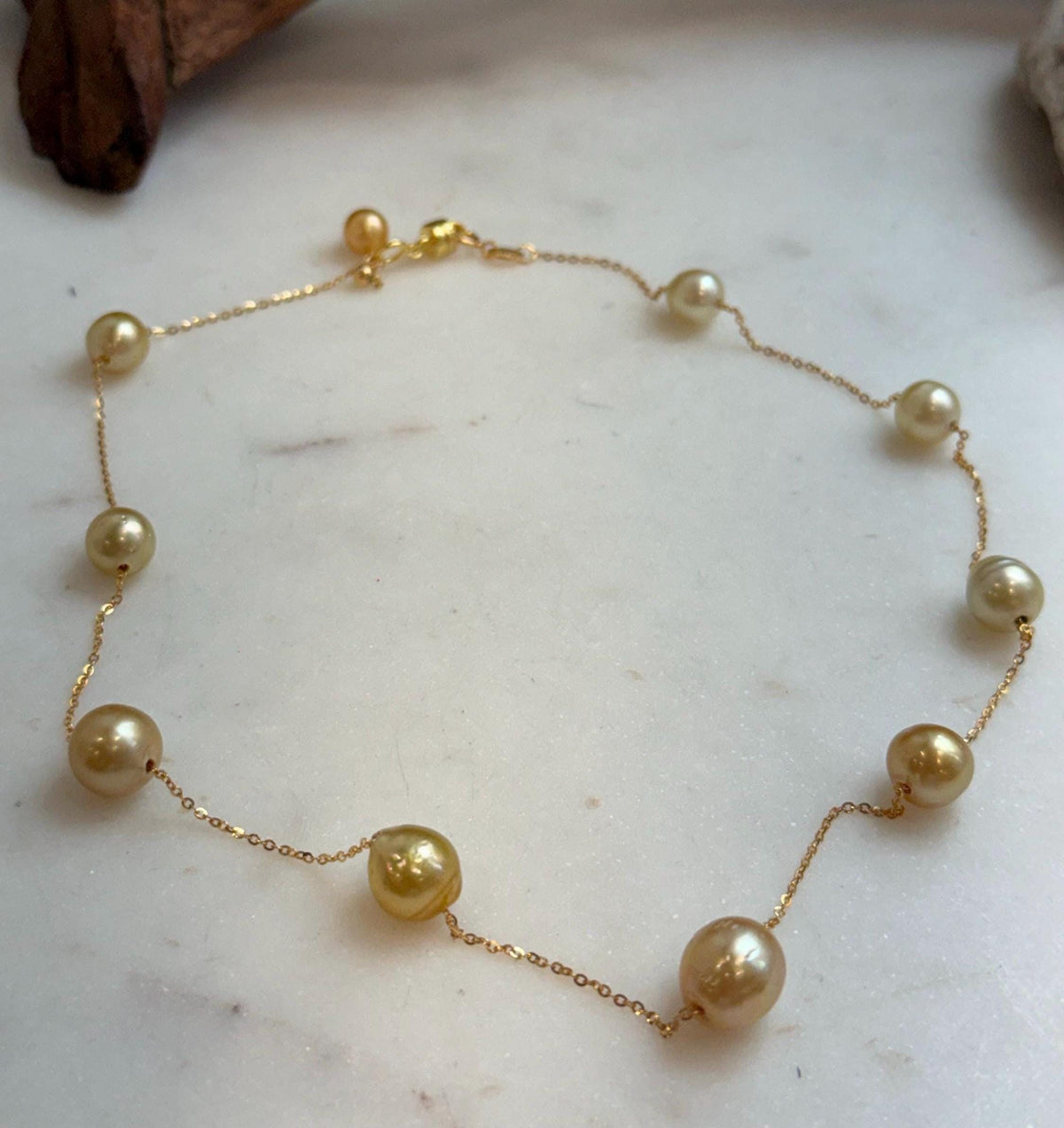 Elly’s 9pcs 8.2-10.1mm South sea golden ocean pearls Satellite Necklace: Extreme luster mirrored, S925 silver satellite necklace, to 17.7”.