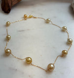 Elly’s 9pcs 8.2-10.1mm South sea golden ocean pearls Satellite Necklace: Extreme luster mirrored, S925 silver satellite necklace, to 17.7”.