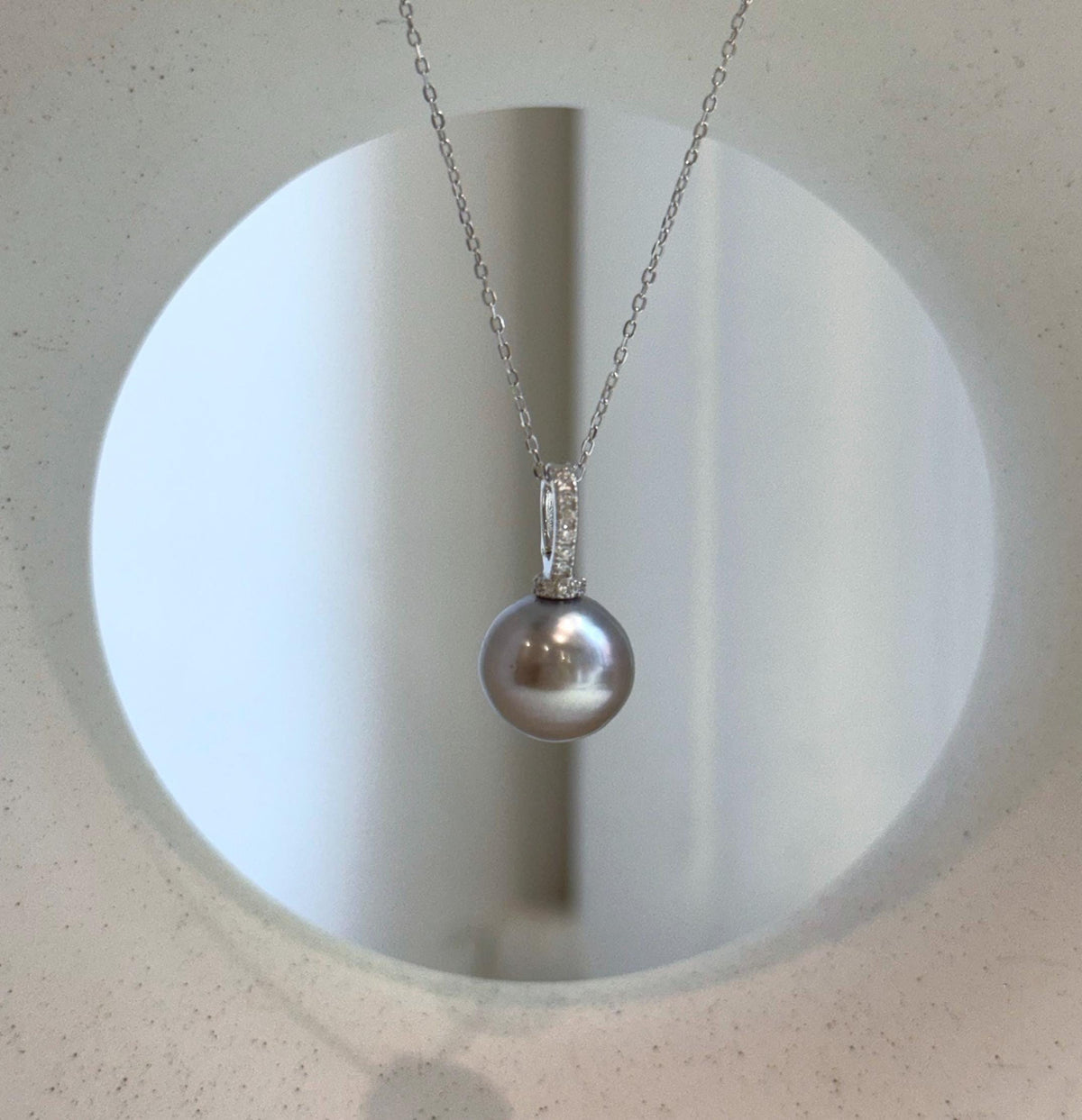 Elly’s 12mm Tahitian platinum ocean Pearl pendant: Extreme luster mirrored, S925 silver minimalist pendant, 2.1cm high.