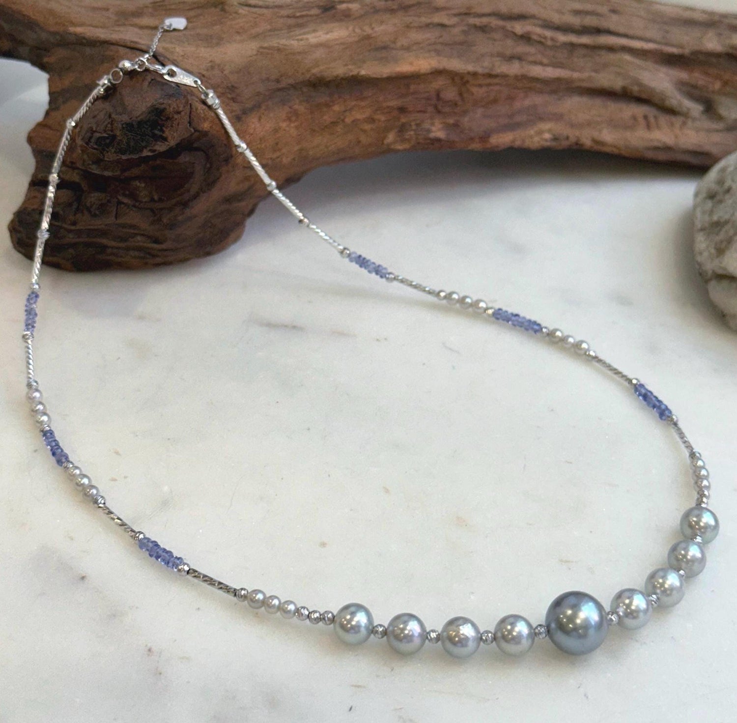 Elly’s Akoya Tahitian ocean pearls Designed Necklace: Extreme luster mirrored, S925 silver Tanzanite Designed necklace, to 18.5”.