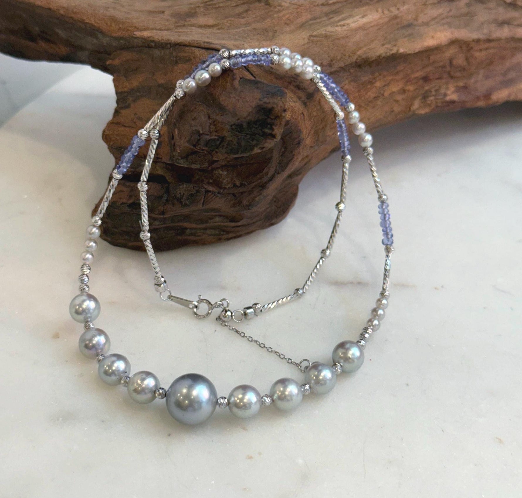 Elly’s Akoya Tahitian ocean pearls Designed Necklace: Extreme luster mirrored, S925 silver Tanzanite Designed necklace, to 18.5”.