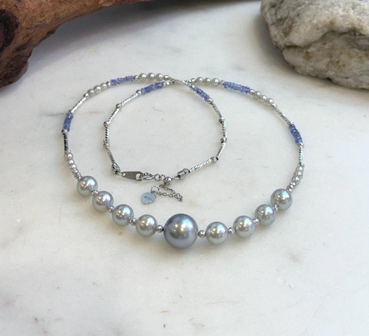 Elly’s Akoya Tahitian ocean pearls Designed Necklace: Extreme luster mirrored, S925 silver Tanzanite Designed necklace, to 18.5”.