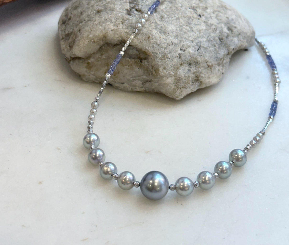 Elly’s Akoya Tahitian ocean pearls Designed Necklace: Extreme luster mirrored, S925 silver Tanzanite Designed necklace, to 18.5”.
