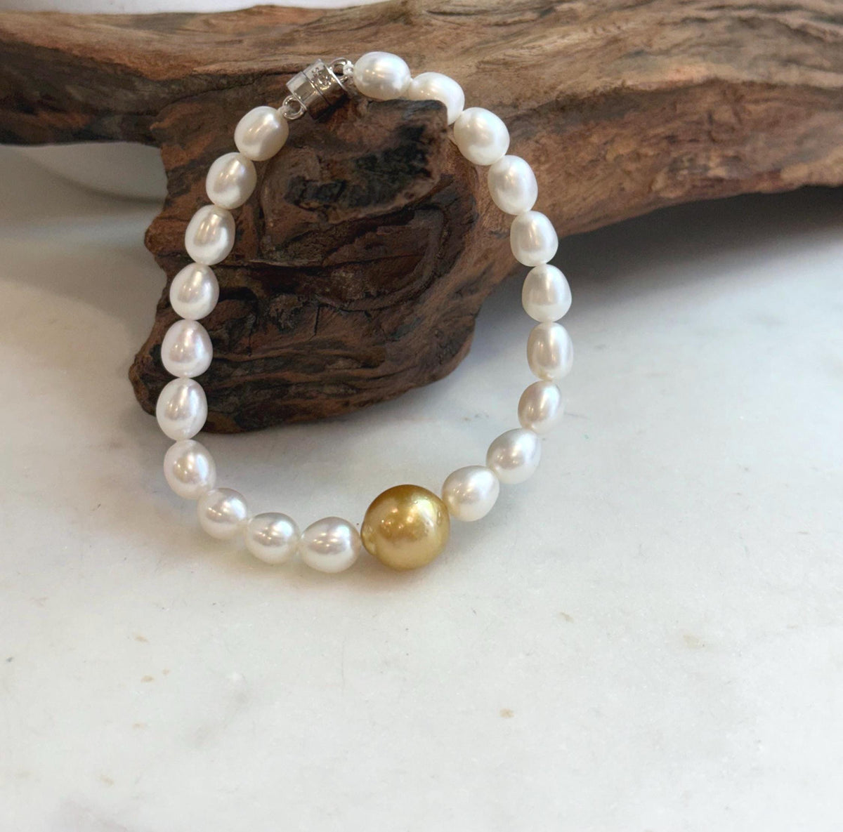 Elly’s 11.2mm South sea deep tea golden Freshwater Pearls Bracelet: Extreme luster mirrored, S925 silver Bracelet. Knotted 7.5”.