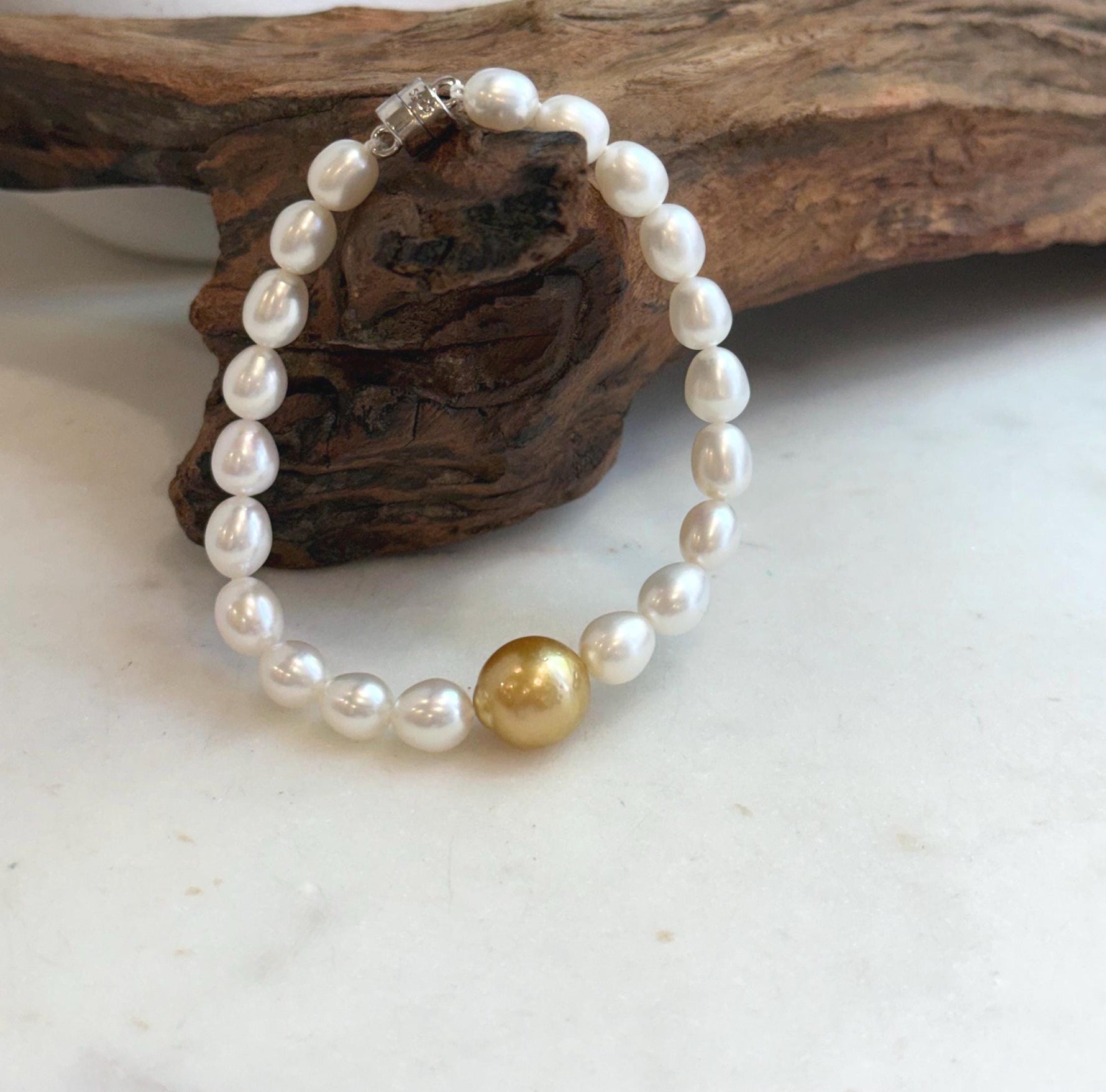 Elly’s 11.2mm South sea deep tea golden Freshwater Pearls Bracelet: Extreme luster mirrored, S925 silver Bracelet. Knotted 7.5”.