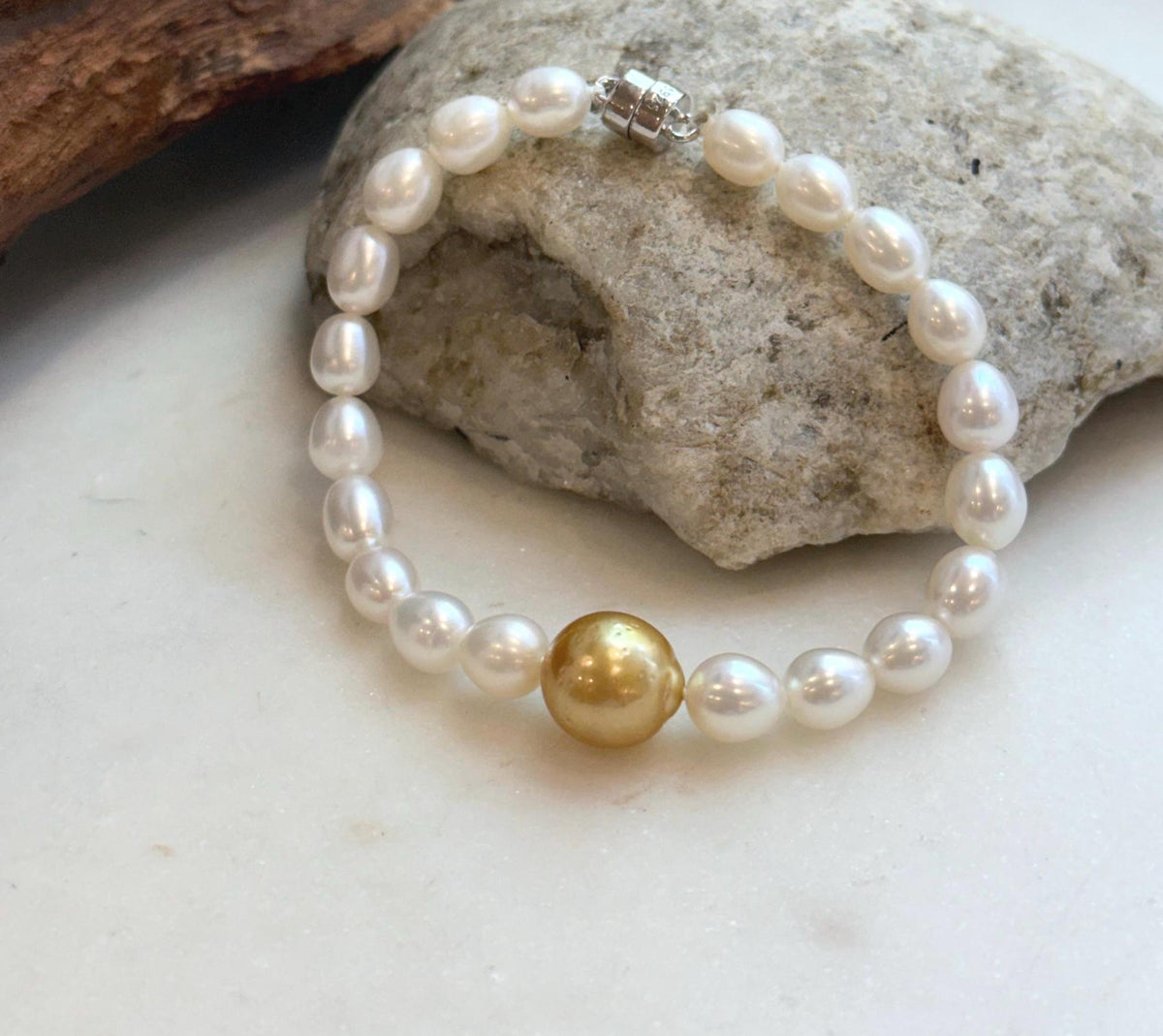 Elly’s 11.2mm South sea deep tea golden Freshwater Pearls Bracelet: Extreme luster mirrored, S925 silver Bracelet. Knotted 7.5”.